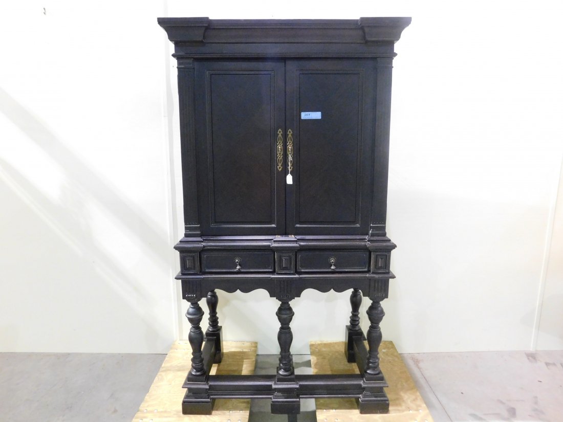 Jacobean lighted bar by Pulaski: Jacobean lighted bar cabinet by Pulaski, dark finish two doors with one adjustable glass shelf, two drawers, rack for wine glasses approx. 39 1/2" wide 71" tall 21 1/4" deep good condition with light 