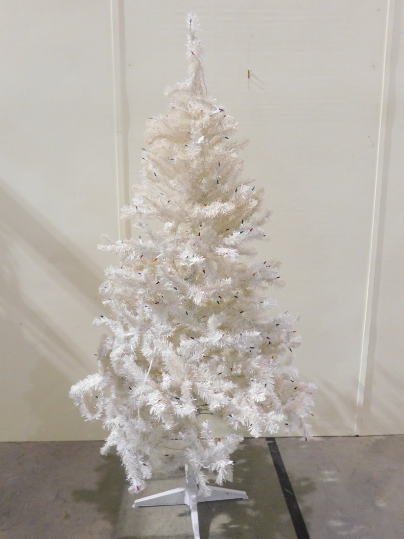white pre-lit Christmas tree: approx. 78" tall white pre-lit Christmas tree on stand lights up and in good condition