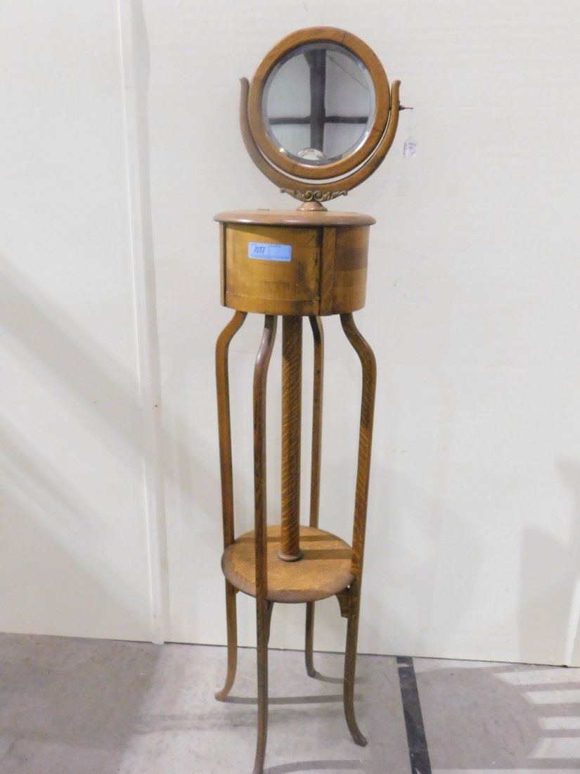 tall oak shaving stand: beautiful antique tall oak shaving stand with small round beveled edge mirror hinged lid on top (missing 2 small screws in one hinge easy fix) approx. 66" tall 15" at the widest point a delicate piece