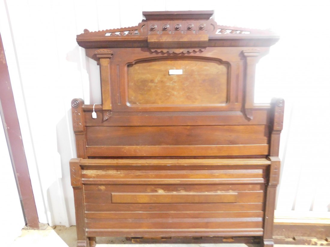 Eastlake Full Size Bed: Eastlake full size bed, including headboard, footboard and side rails. Headboard is approx. 57 1/2 inches wide, 69 inches tall. Footboard is approx. 30 inches tall. Shows wear, overall good condition.