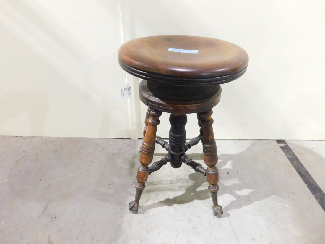 Piano Stool with Claw Feet: Wooden swivel adjustable height piano stool with glass balls claw feet. Overall good condition.