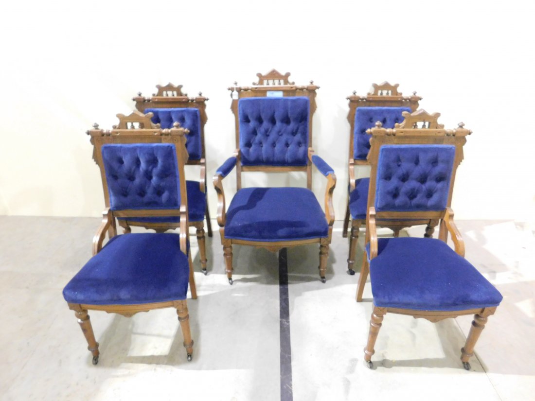 Set of 5 Eastlake Dining Room Chairs: Set of five wooden Eastlake dining room chairs with blue velvet padded seats and backs, consisting of one arm chair and 4 side chairs. Excellent condition.