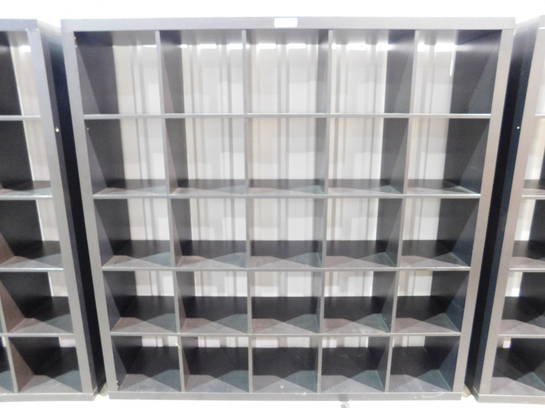 Wooden Cubicle Display Shelving Unit: Wooden cubicle display shelving unit, dark finish. NOTE: Lots 1095, 1096 and 1097 are all matching units, being sold separately. Approx. 72 3/4 inches wide, 15 3/8 inches deep, 72 3/4 inch tall. 25 cu