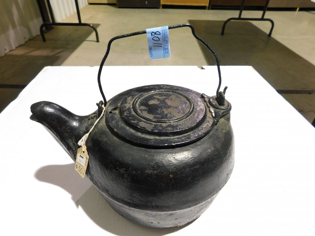 Cast Iron 8 Quart Tea Kettle: Cast iron 8 quart tea kettle with spout, lid and wire handle. Overall very good condition.