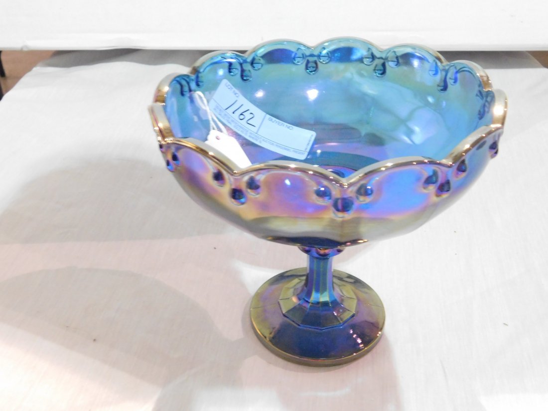 blue carnival glass compote on pedestal: blue carnival glass compote on pedestal, approx. 8 1/2" diameter, 7 1/2" tall. excellent condition no chips or cracks