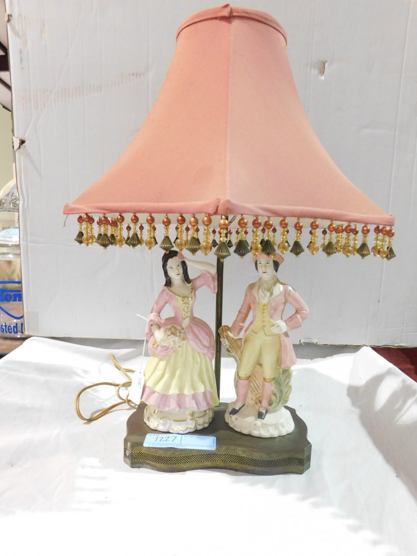 victorian capodimonte style figural lamp: vintage table top victorian figural lamp, metal base, ceramic man and woman, vintage shade with tassles, excellent condition