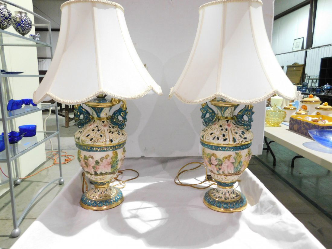 2 capodimonte style lamps: matching set of capodimonte style ceramic lamps with dragon head handles, approx. 24" tall with shades, good condition