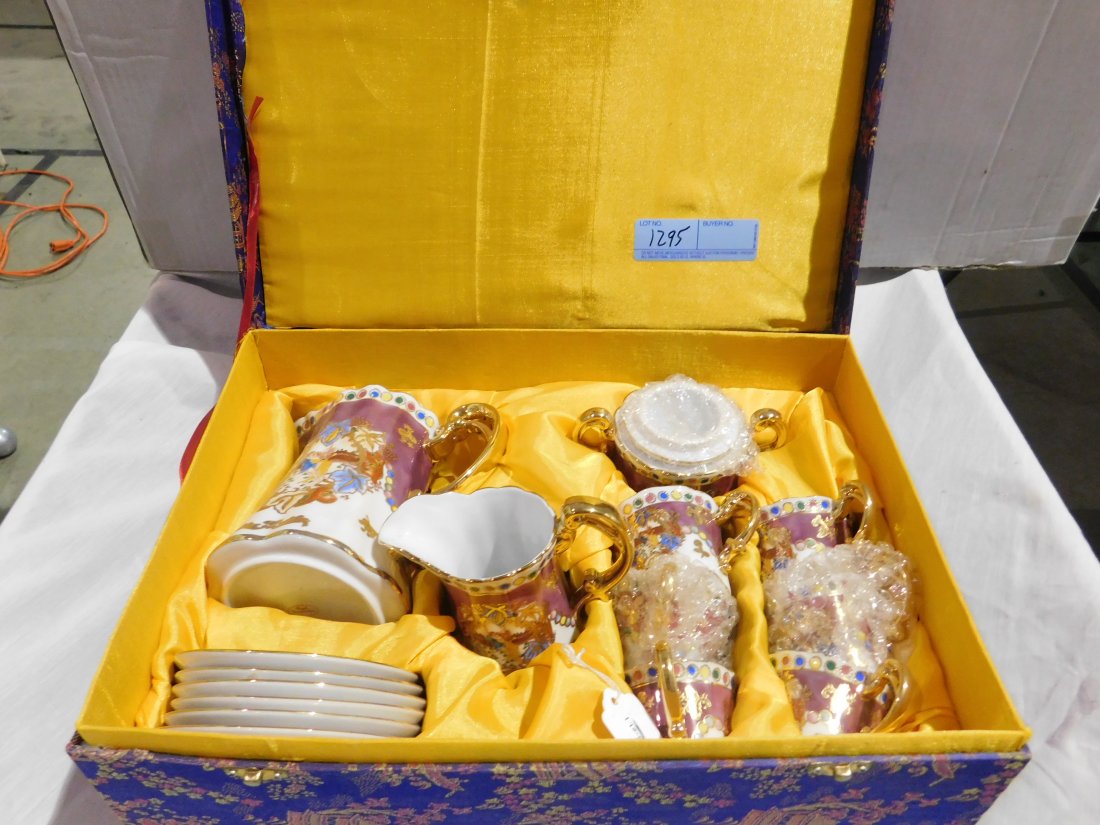 Royal Fine Porcelain Tea Set: Royal Fine porcelain tea set in box, including tea pot, creamer, sugar, 6 cups and 6 saucers. Excellent, unused condition.