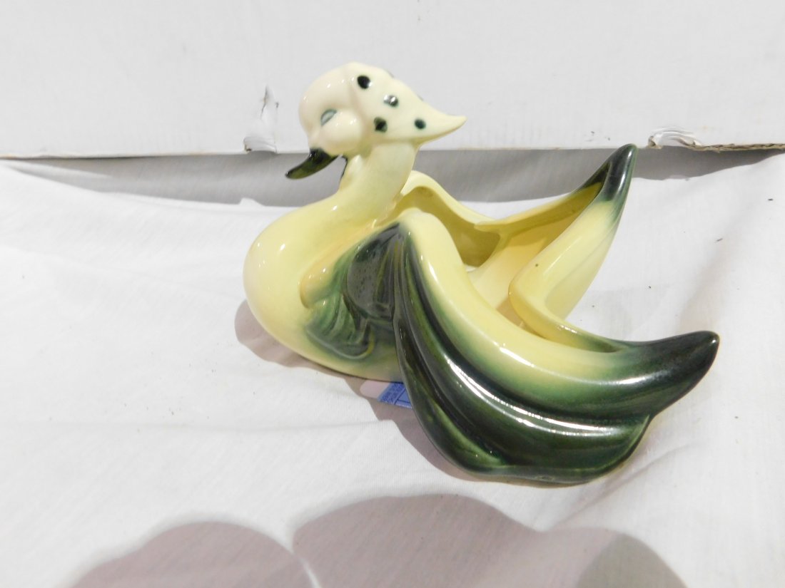 Hull Pottery Yellow "Bandana" Duck Planter: Hull Pottery yellow \\\"bandana\\\" duck planter, approx. 5 inches tall, 6 1/2 inches long, 6 3/4 inches wide. Very good condition, no chips or cracks.