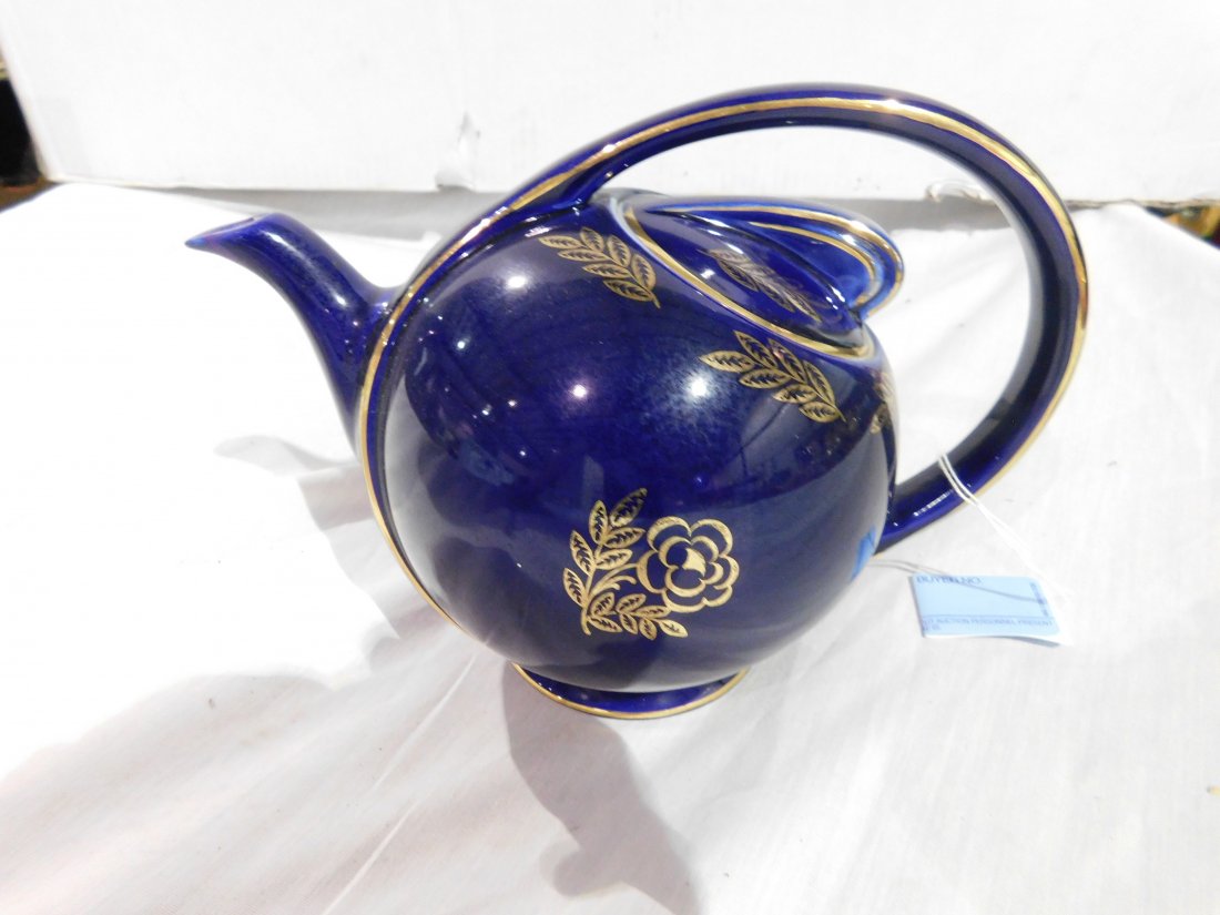 Hall Ceramic Cobalt Blue & Gold Tea Pot: Hall ceramic cobalt blue & gold 6 cup tea pot with lid. Lid has been repaired. Otherwise, good condition.