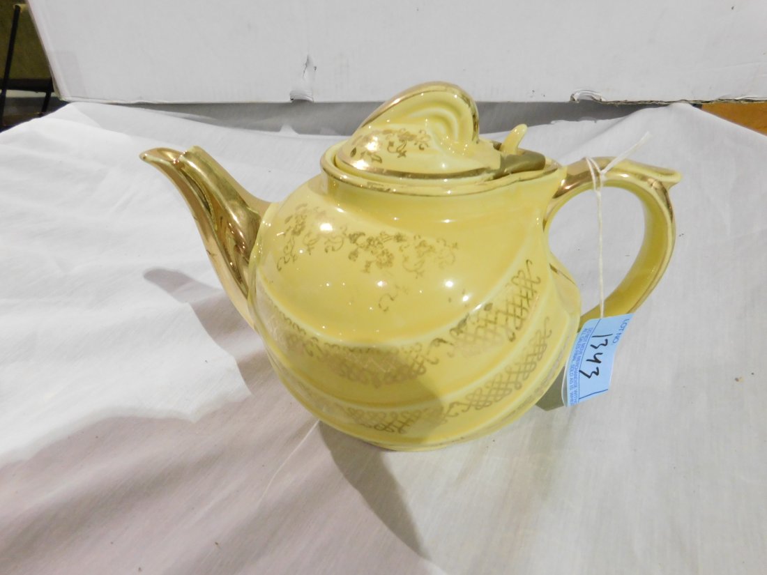 Hall 6 Cup Tea Pot: Hall 6 Cup ceramic Tea Pot with lid, yellow with gold trim and floral design. Good condition, light wear, no chips or cracks.