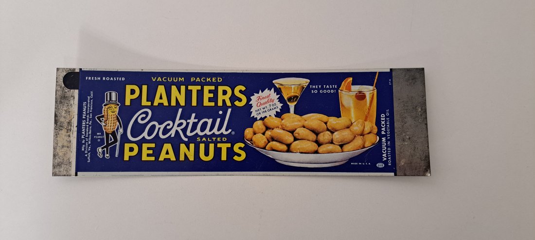 unrolled planters peanut 7 oz. cocktail tin: sheet of tin that is actually a 7oz. planters peanut cocktail tin that was never rolled and made into a can, approx. 3.25"x 11" excellent condition please verify auction location if picking up