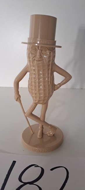 mr peanut mauve colored plastic bank (1 of 3)