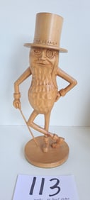 wooden Mr. Peanut statue