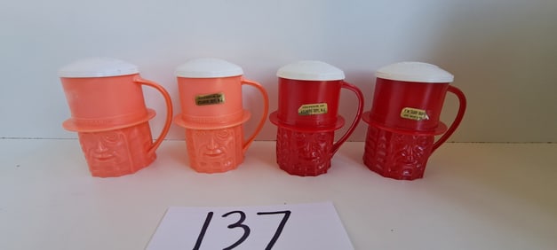 2 sets of Mr. Peanut plastic cup s&p shakers