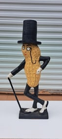 cast iron reproduction Mr. Peanut fence post sitter