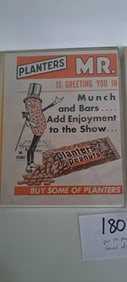 pair of framed Planters Peanut ads