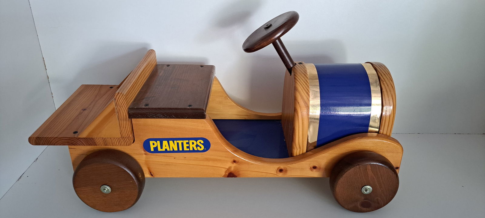 Planters Peanut wooden roadster truck: wooden Planters Peanut child's ride on roadster truck, very good condition, approx. 27" long, please verify auction location for pick up