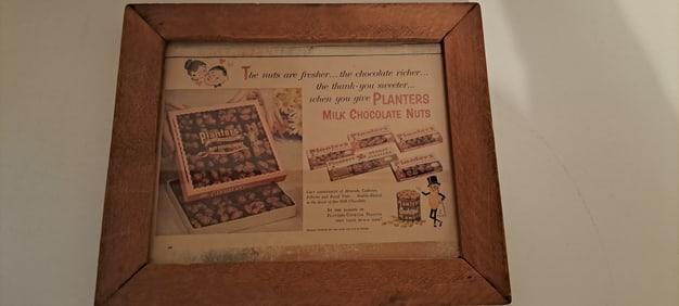 Planters Peanut framed ad for milk chocolate nuts