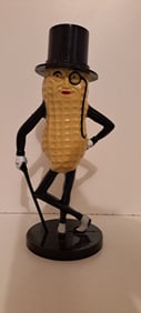 black and tan Mr. Peanut plastic bank