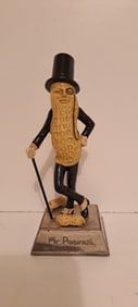 Mr. Peanut pot metal statue