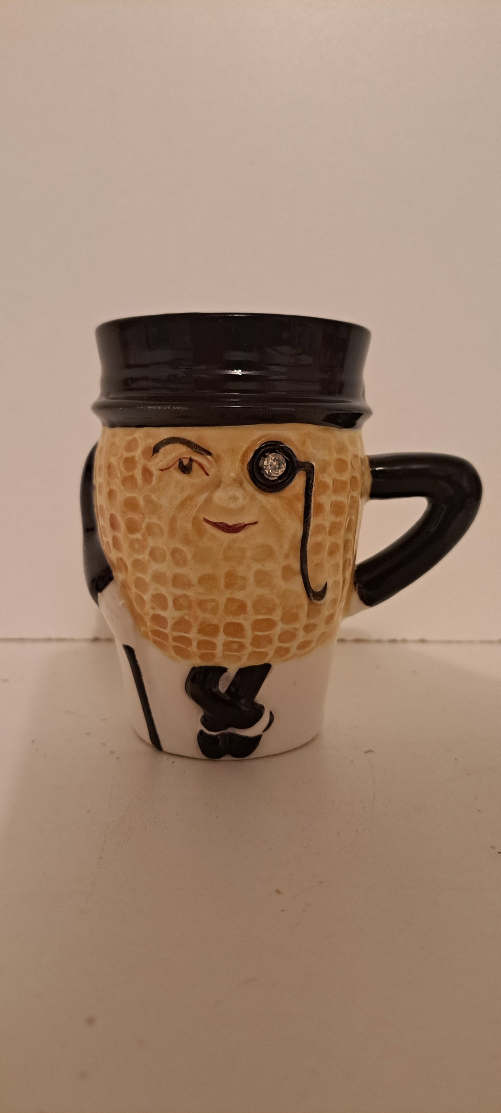 Mr. Peanut ceramic cup (1 of 2)