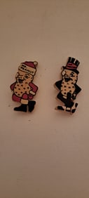 wooden Santa and lucky Mr. Peanut pins