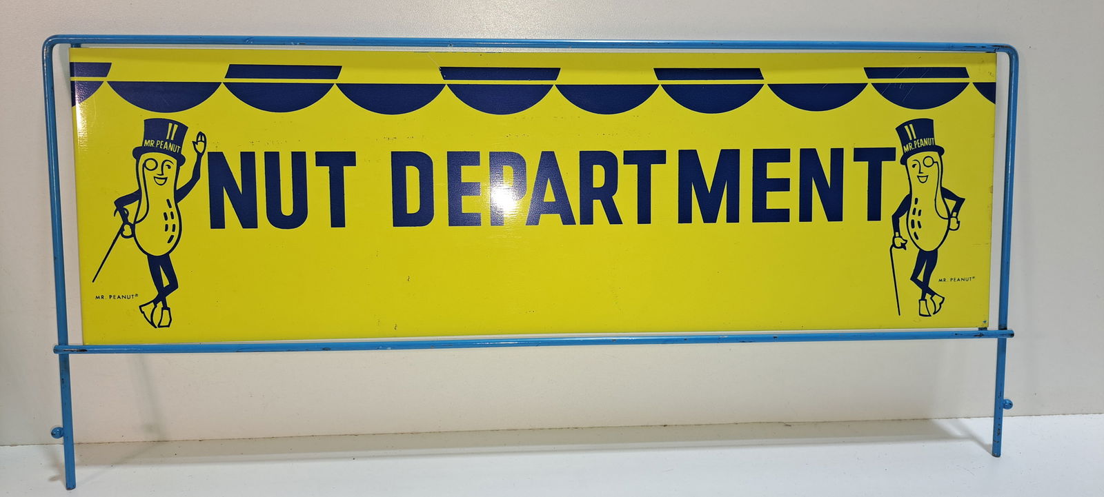 Planters Peanut tin rack sign: Planters Peanuts, double sided, " NUT DEPARTMENT ", painted, tin, rack topper, sign, has two Mr. Peanuts on each side, sign itself approx. 6.5"x 20.5", minor wear, strong color, Please note: if pickin