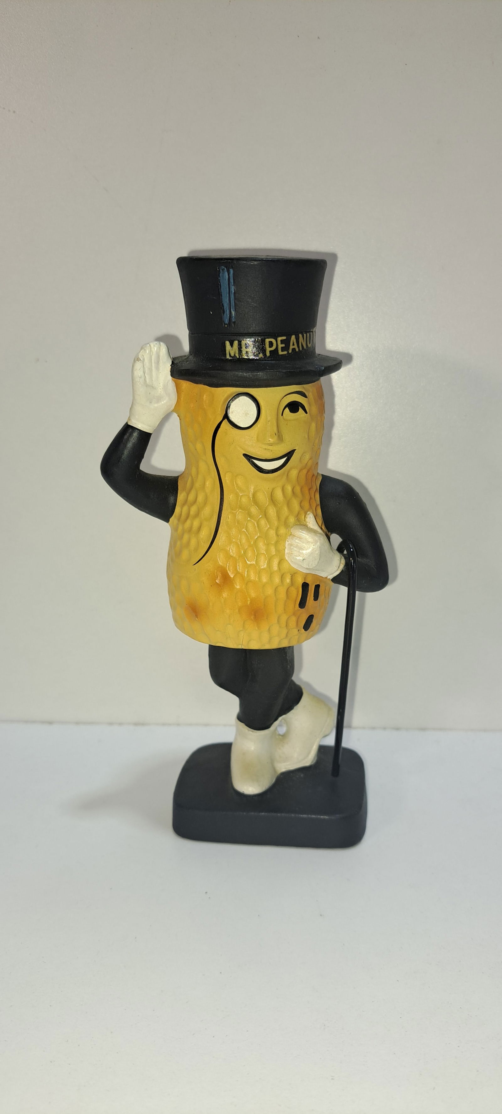 Mr. Peanut nodder: Mr. Peanut, ceramic, figural nodder, made by Lego, complete with cane, a few hairline cracks but still displays nice, approx. 6.5" tall, Please note: if picking up, location is different than auction