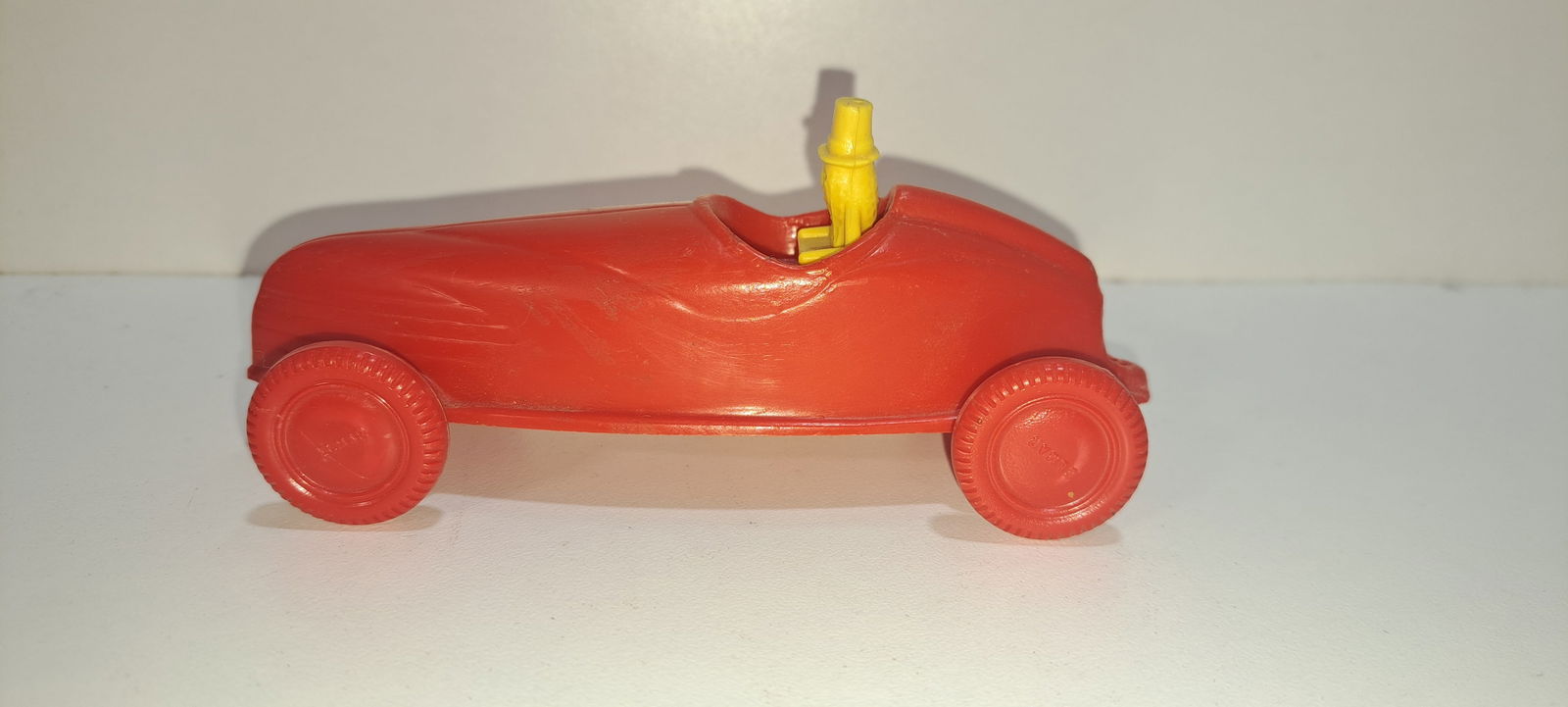 Mr. Peanut jet racer: hard to find plastic, Mr. Peanut Elmar jet racer, red car with red wheels, yellow Mr. Peanut, very good condition, approx. 5" long, Please note: if picking up, location is different than auction