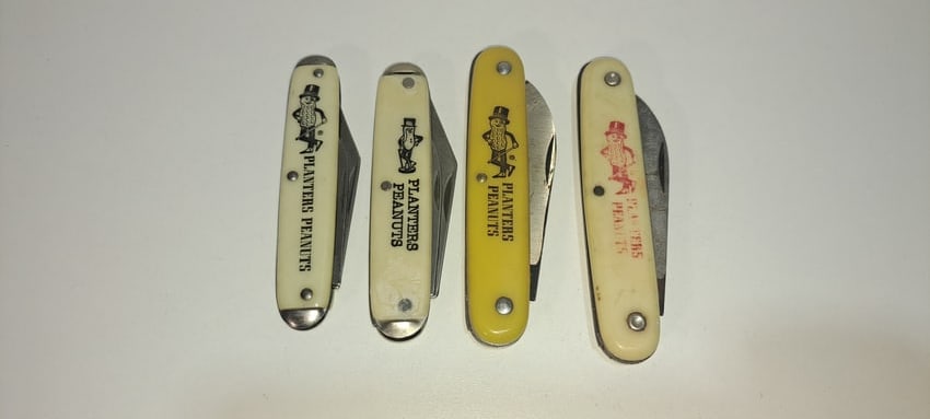 4 Mr. Peanut pocket knives: lot of 4 different variations of Mr. Peanut advertising pocket knives, minor wear as shown, each approx. 3.75" long folded, Please note: if picking up, location is different than auction location.