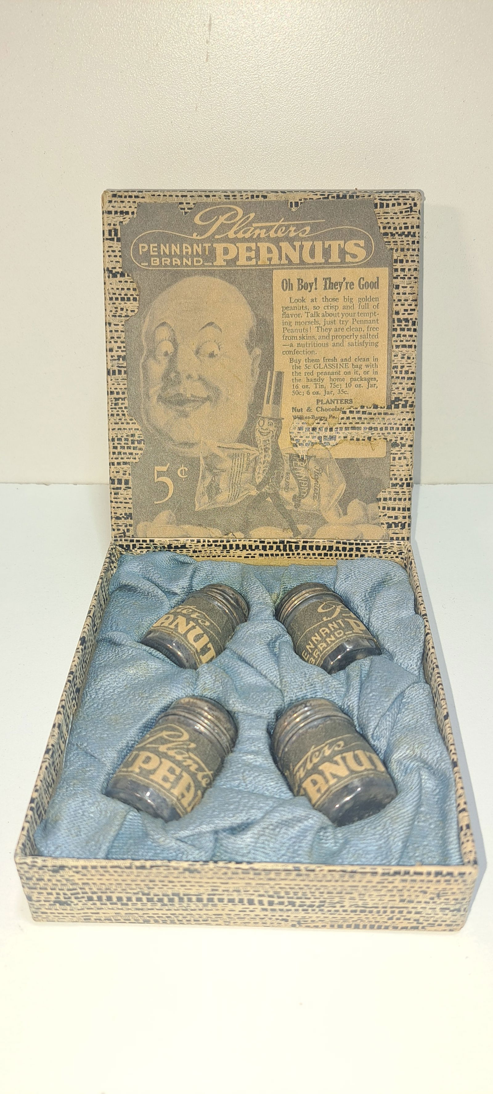 Planters Peanuts salt and pepper shakers in box: set of 4 small salt and pepper shakers in original box advertising Planters Peanuts, each shaker approx. 1.25" tall, box 4" x 4.5" x 1", good condition, Please note: if picking up, location is