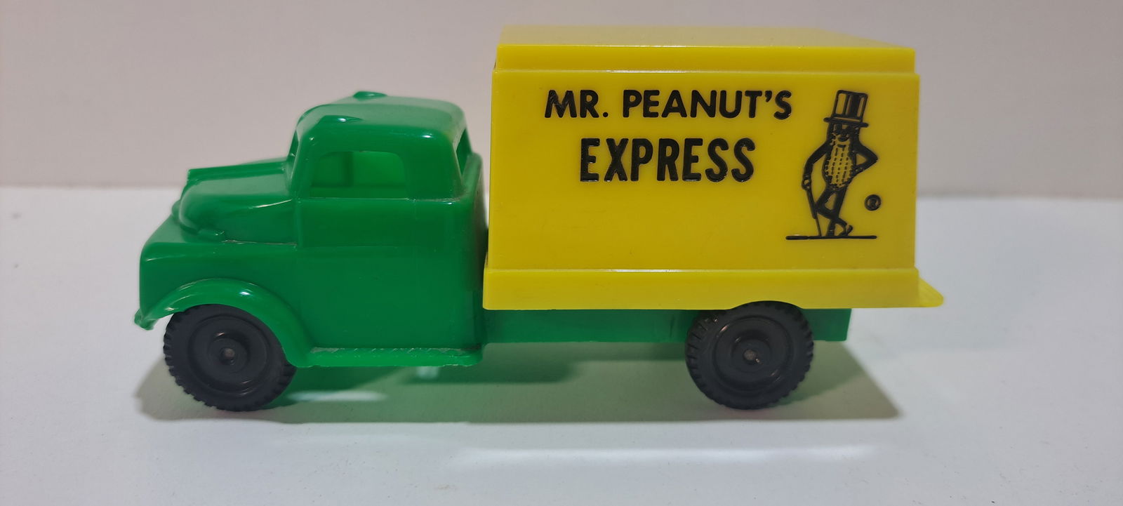 Mr. Peanut express truck: Pyro Plastics, Mr. Peanut's express truck, front left bumper has damage, approx. 5.5" long, Please note: if picking up, location is different than auction location. Please contact us for options