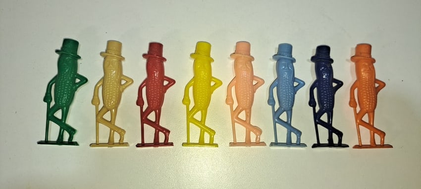 (8) Mr. Peanut whistles: 8 different color, plastic, figural, Mr. Peanut whistles, green, tan, red, yellow, pink, light blue, blue, orange, in good condition, each approx. 2.5" long, Please note: if picking up, location is di