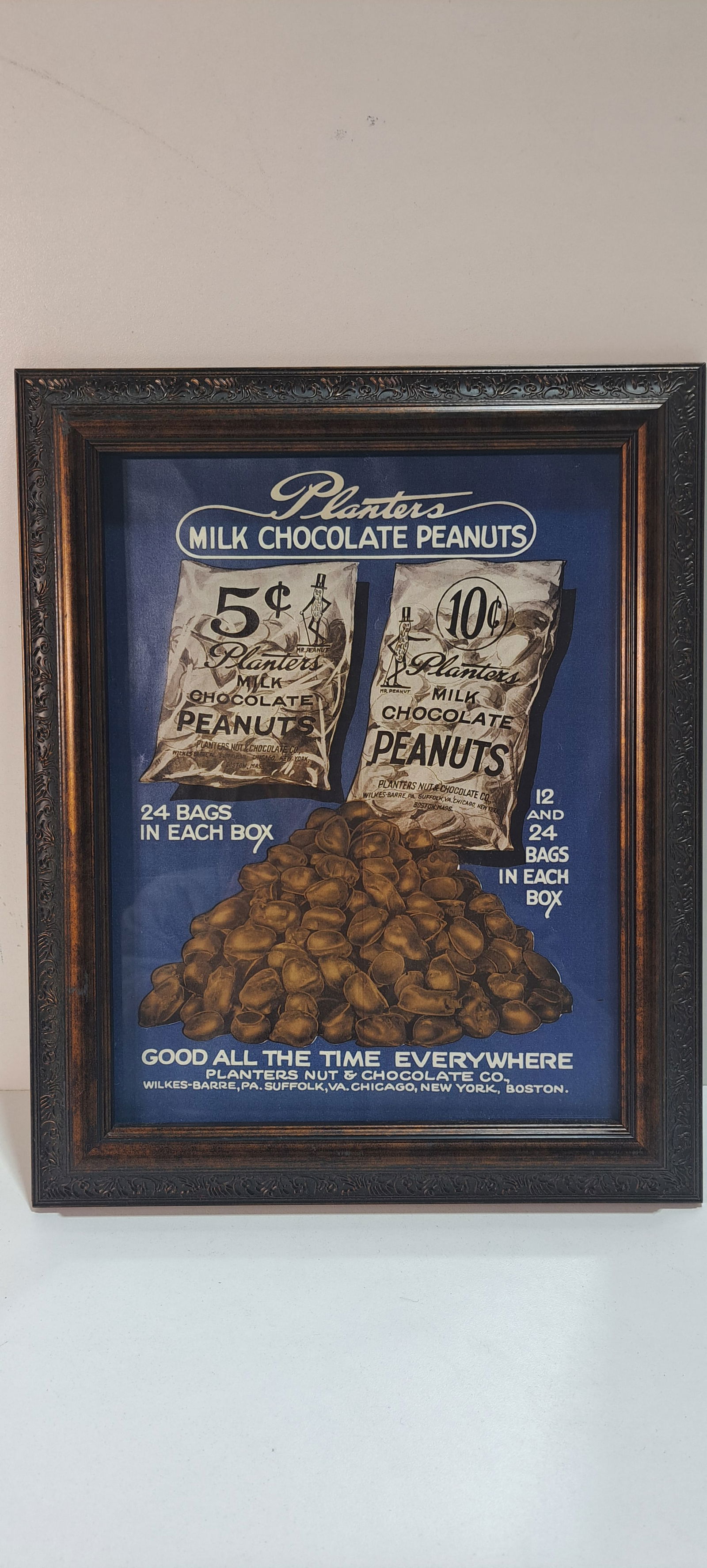 Planters Peanuts framed Ad: framed paper advertising for Planters Milk Chocolate Peanuts, very good condition, approx. 11" x 13.5", Please note: if picking up, location is different than auction location. Please contact us for o