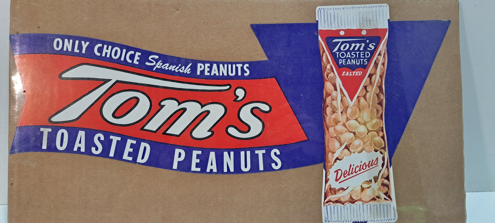 Tom's Peanut paper sign: Tom's Peanut paper advertising piece shrink wrapped to cardboard for display, very good condition, approx. 10" x 19.5", Please note: if picking up, location is different than auction location. Please