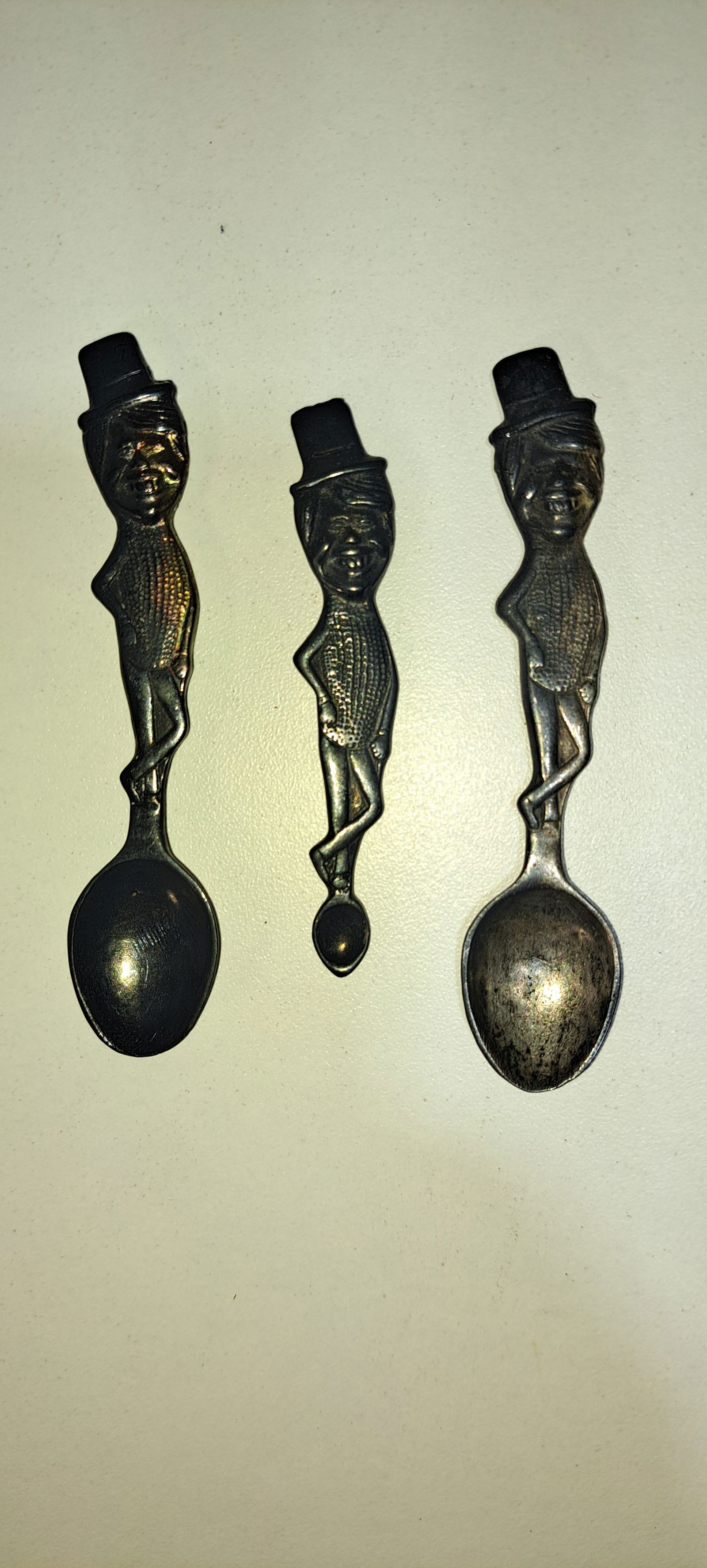 (3) goofy Jimmy Carter spoons: 3 goofy style Jimmy Carter spoons, his body looks like a peanut, marked J.D. Holway 1977, appear to be silverplate?, some wear, 2 approx. 3.75" long, 1 approx. 3" long, Please note: if picking up,