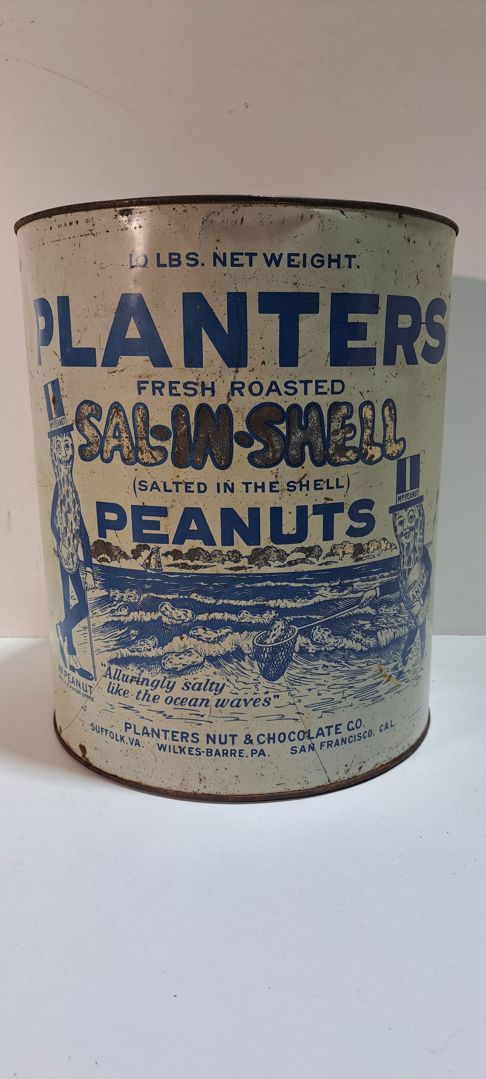 Planter Peanuts Sal-N-Shell tin: rare, Planters Peanuts, 10 lb. Sal-N-Shell tin, great graphics showing Mr. Peanut scooping up peanuts out of the ocean, no lid, some scratches, minor dents, and minor rust, still displays nice and a h