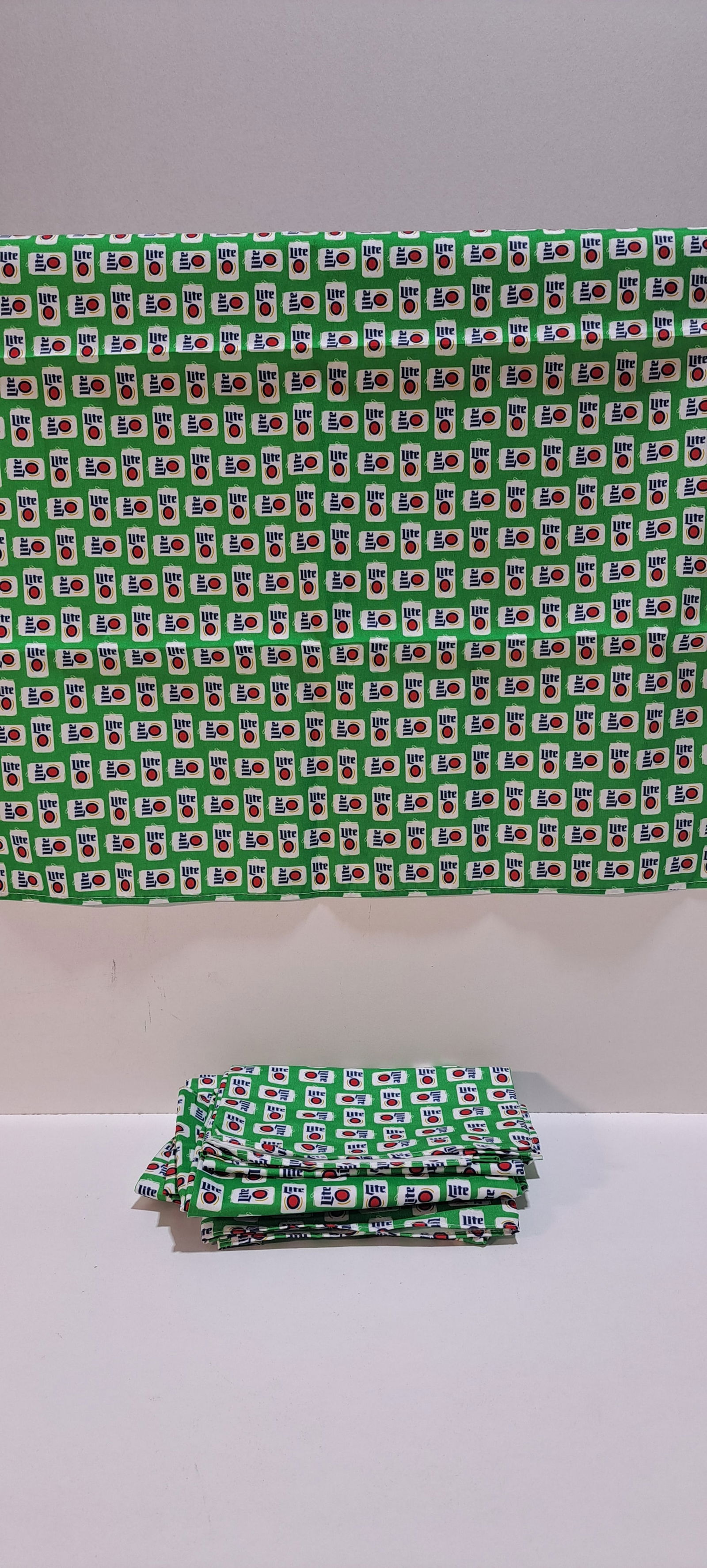 (9) Miller Lite cloth napkins: set of 9 Miller Lite large cloth napkins, unused, excellent condition, each approx. 21.5" x 21.5", Please note: if picking up, location is different than auction location. Please contact us for