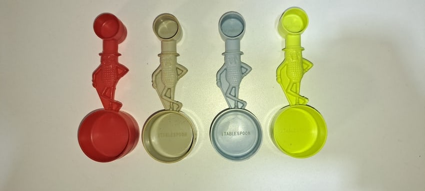 (4) Mr. Peanut measuring spoons: set of 4 different colored plastic, Mr. Peanut measuring spoons, red, gray, blue, lime, all in good condition, each approx. 4.25" long, Please note: if picking up, location is different than auction