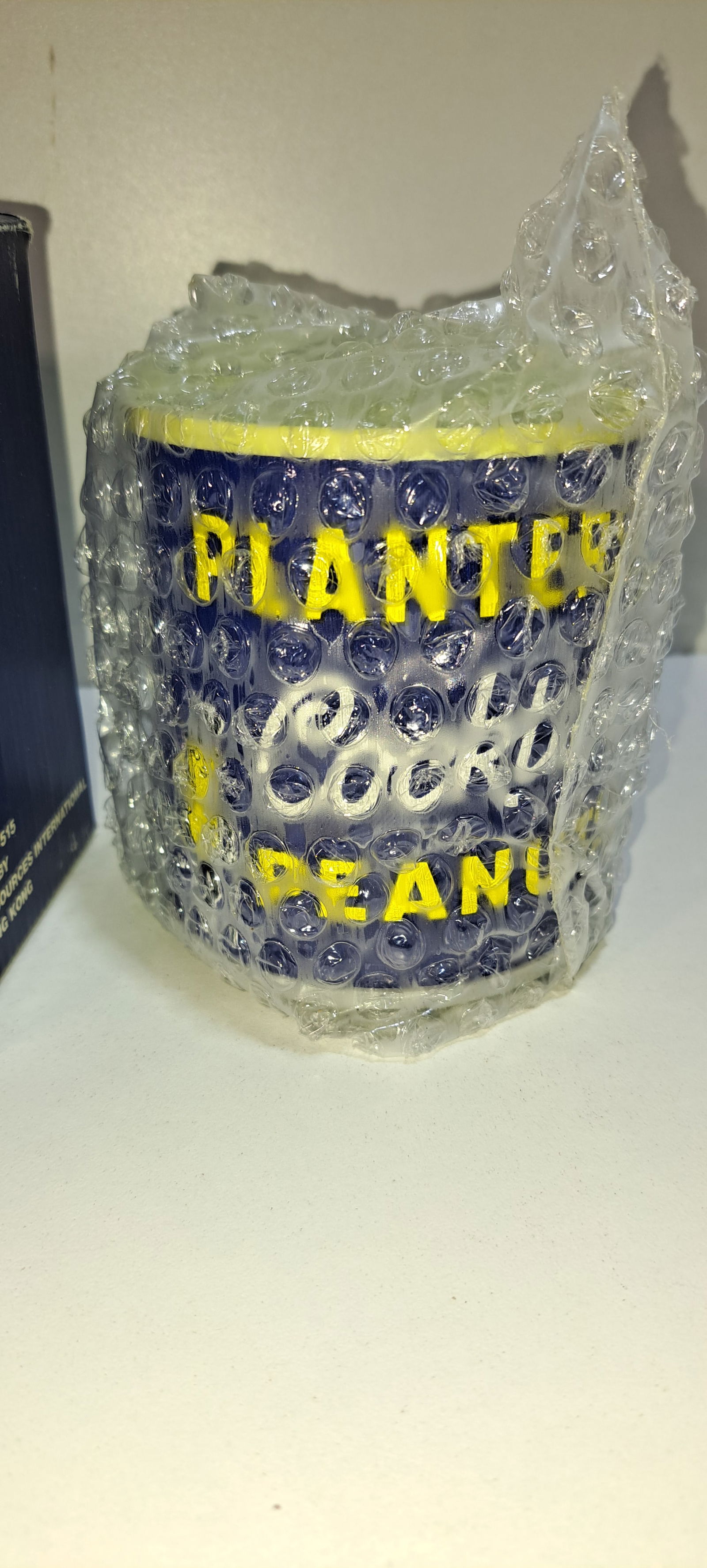 Planters Peanuts can radio: Planters Peanuts radio shaped like a cocktail peanuts can, still in plastic, in original box, battery included, and warranty card, untested, but in excellent original condition, radio approx. 4" tall,