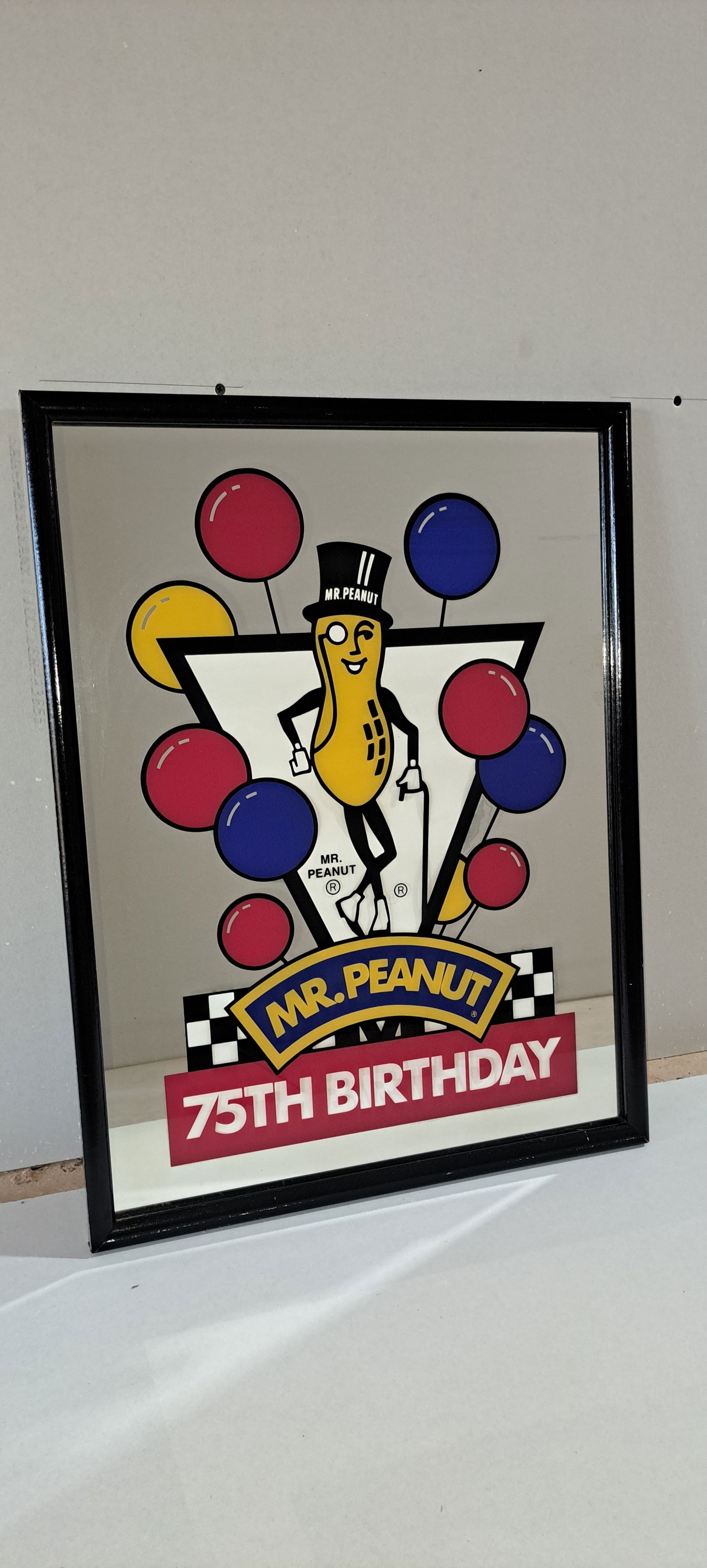 Mr. Peanut 75th birthday mirror: large, framed, Mr. Peanut 75th birthday mirror in original cardboard shipping box, good condition, approx. 19" x 25", Please note: if picking up, location is different than auction location. Please