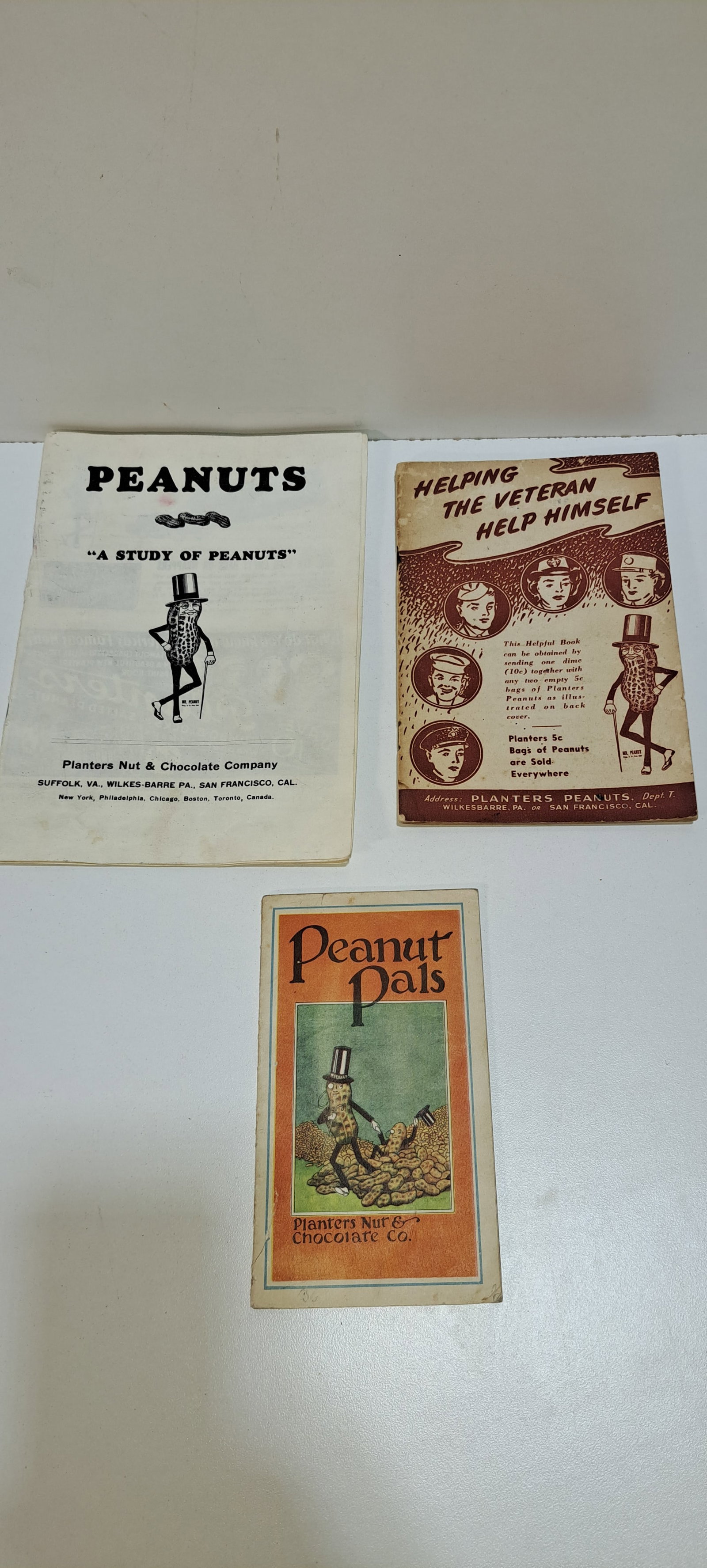 (3) Planters Peanuts booklets: 3 Planters Peanuts, booklets, A Study Of Peanuts, Helping The Veteran Help Himself, & Peanut Pals, all show some wear, Please note: if picking up, location is different than auction location. Please c