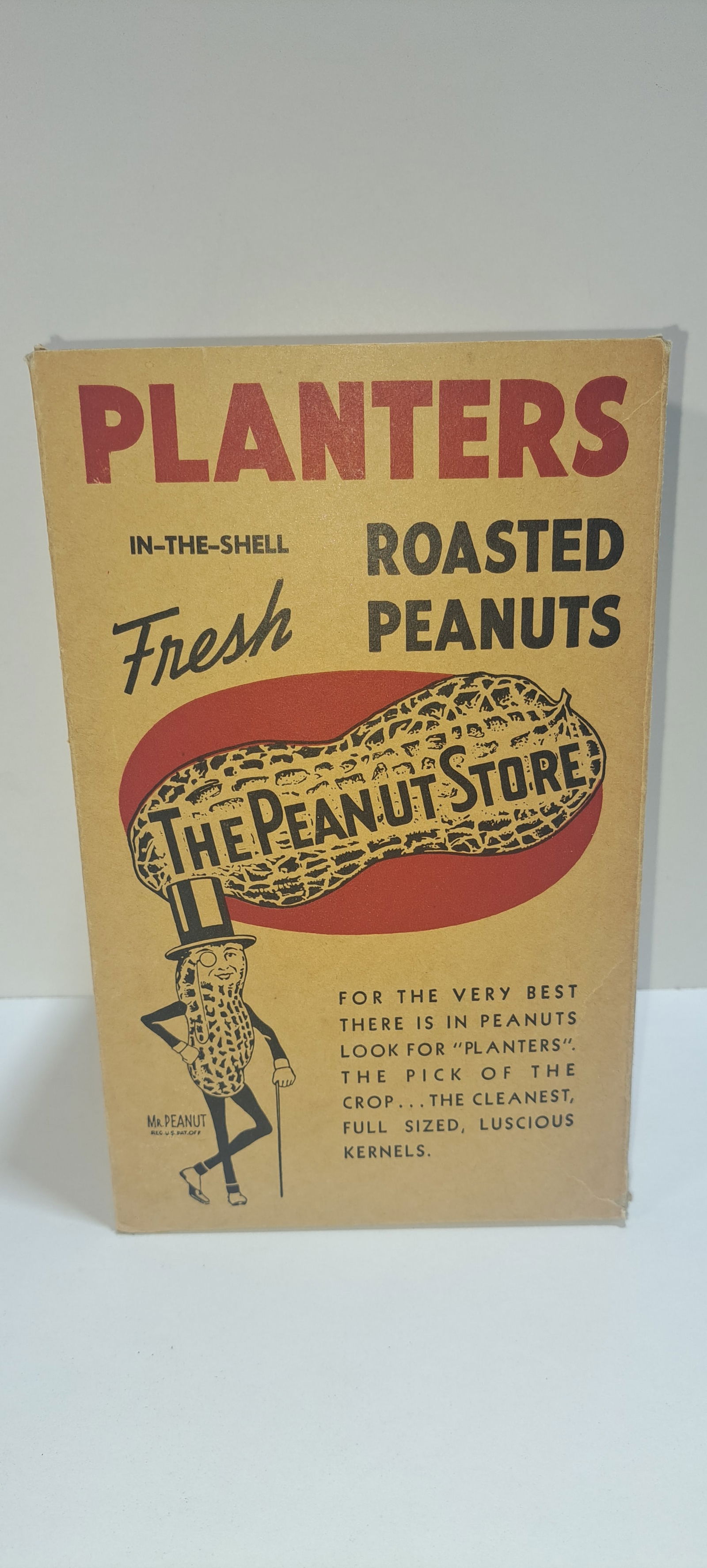 Planters Peanuts cardboard box: Planters Peanuts cardboard box, held 3 lbs. from The Peanut Store, with Mr. Peanut, shows minor wear, strong color, approx. 6.25" x 6.25" x 10", Please note: if picking up, location is different than