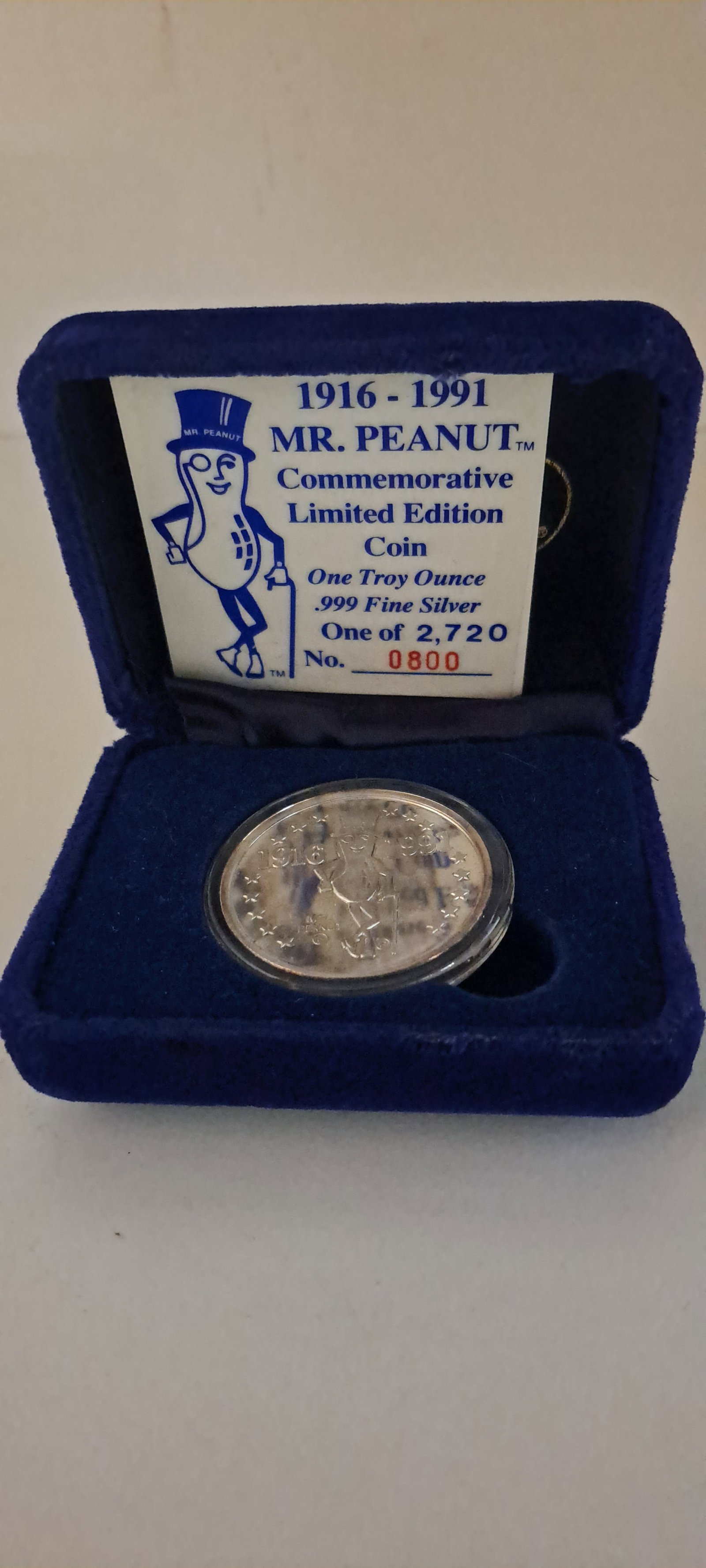 Mr. Peanut silver coin: Mr. Peanut 75th birthday, 1916-1991, commemorative, siler coin, in original case. Limited edition, #800 of 2,720. One troy ounce .999 fine silver. Excellent condition. Please see our shipping policy f