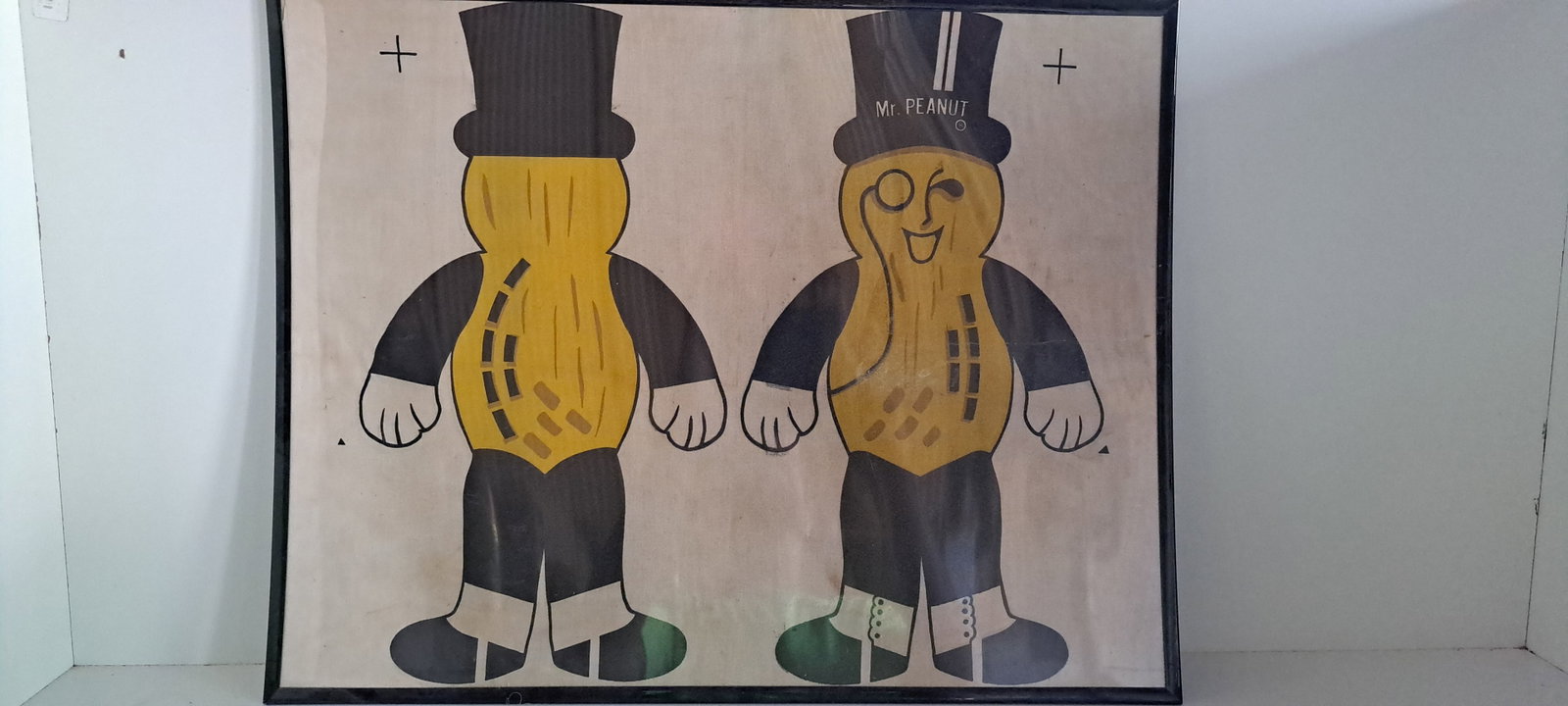 Mr. Peanut cloth doll material: Framed, fabric for the Mr. Peanut cloth doll. Unused. Plastic has a crack. Fabric is in very good condition. Approx. 22" x 28". Please see our shipping policy for options.