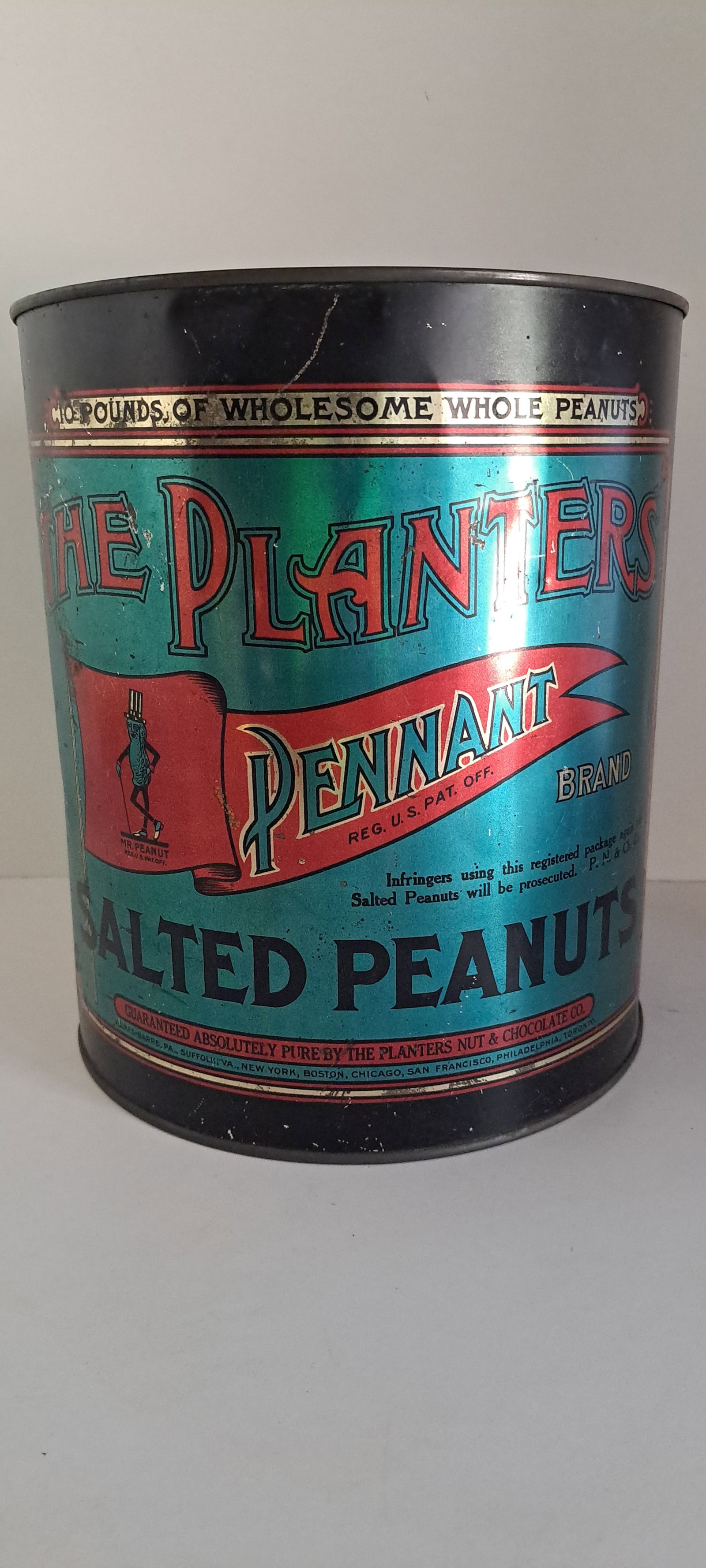 Planters Peanuts 10 lb. tin: Planters Peanuts, 10 lb. pennant brand tin, with lid. Shows wear. Approx. 9.75" tall. Please see our shipping policy for options.