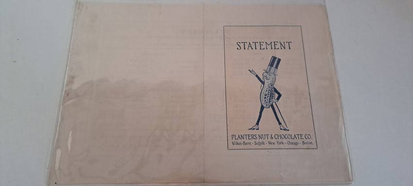 1921 Planters Nut & Chocolate Co. statement: Accounting statement dated March 31, 1921 for the Wilkes-Barre, and Suffolk plants of the Planters Nut & Chocolate Company. Nice early image of Mr. Peanut. Minor wear. Approx. 8" x 11". Double sided.
