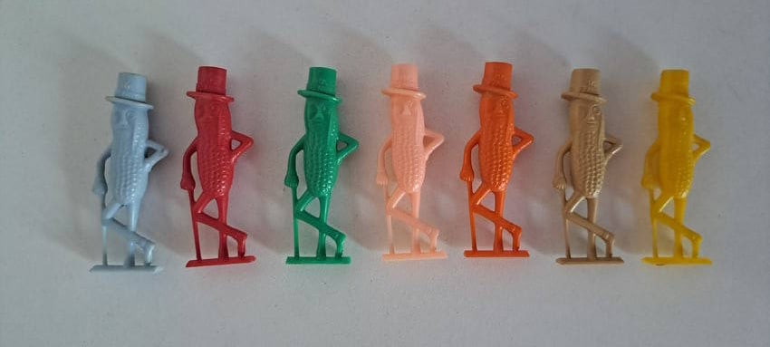 (7) Mr. Peanut whistles: 7 plastic, Mr. Peanut whistles. Blue, red, green, pink, orange, tan, yellow. all in good condition. Each approx. 2.5" tall. Please see our shipping policy for options.