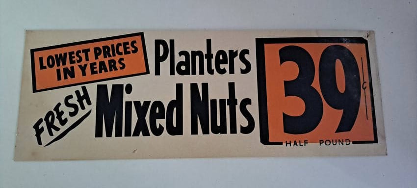Planters Peanuts cardboard sign: Planters Peanuts cardboard sign for mixed nuts. Minor water damage on right side. Approx. 8" x 22". Please see our shipping policy for options.